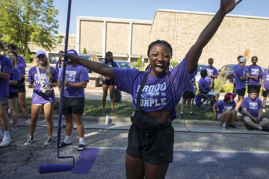 A student full of excitement at Paint It Purple at UW-Whitewater.